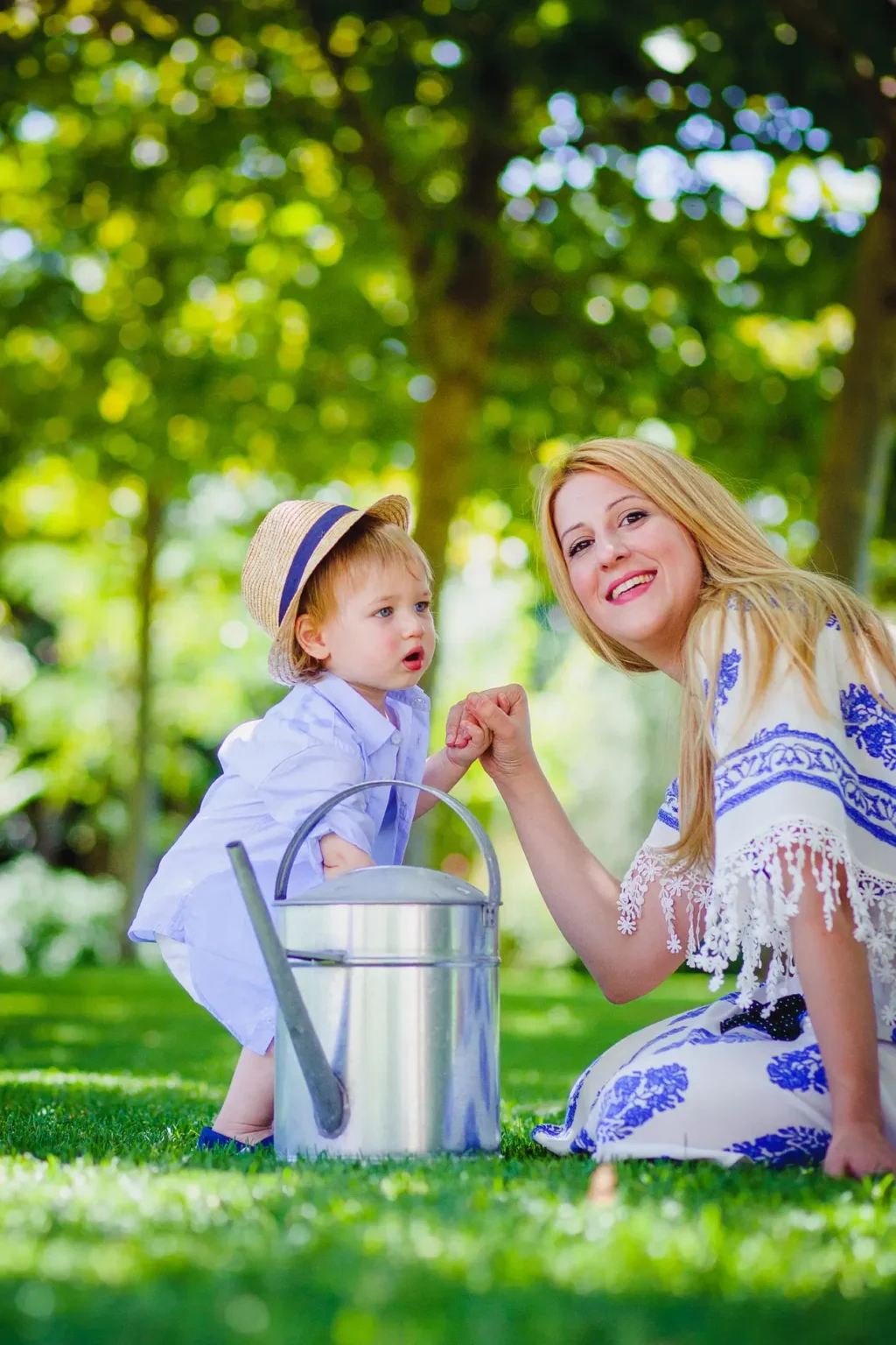 a woman and a child holding hands