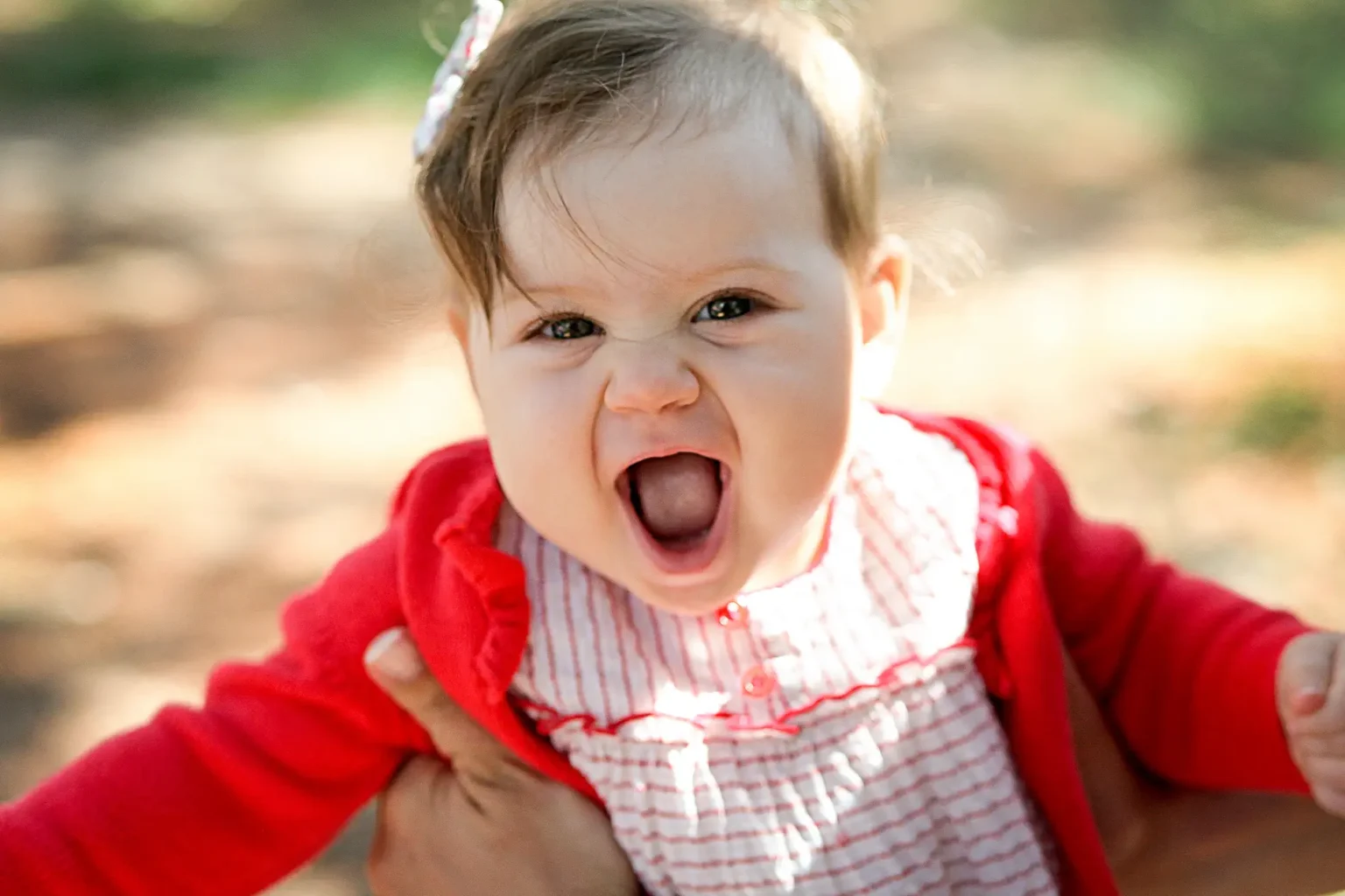 a baby with mouth open