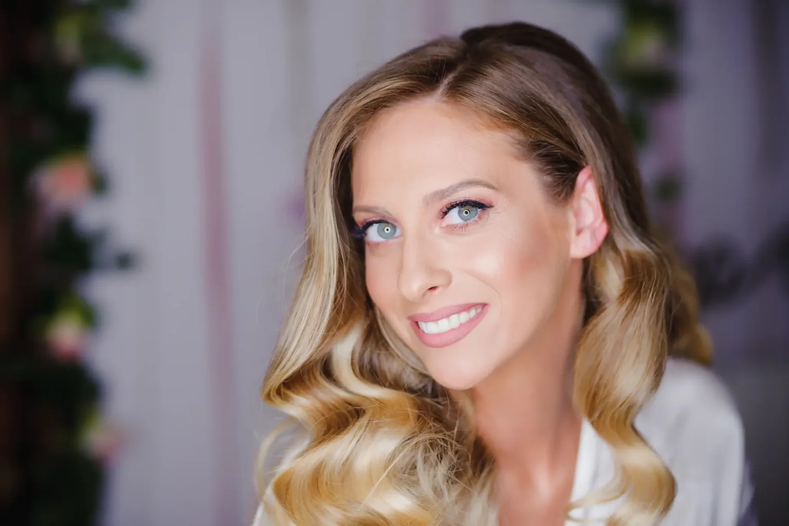 a woman smiling at the camera