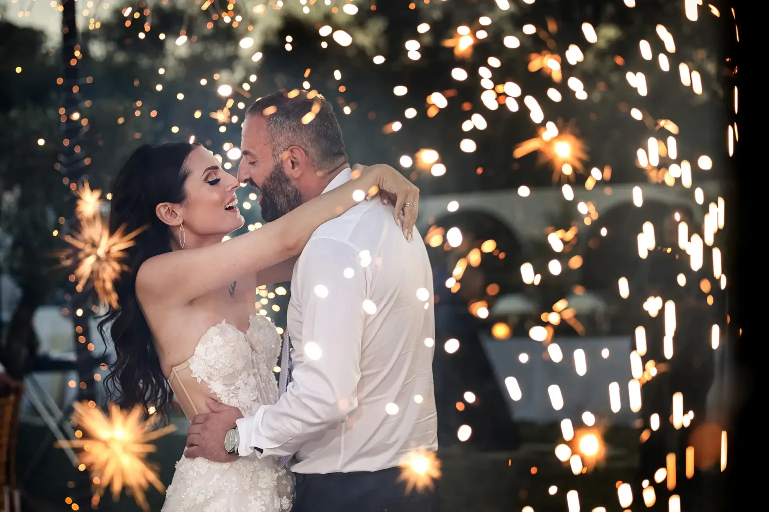 a man and woman hugging each other